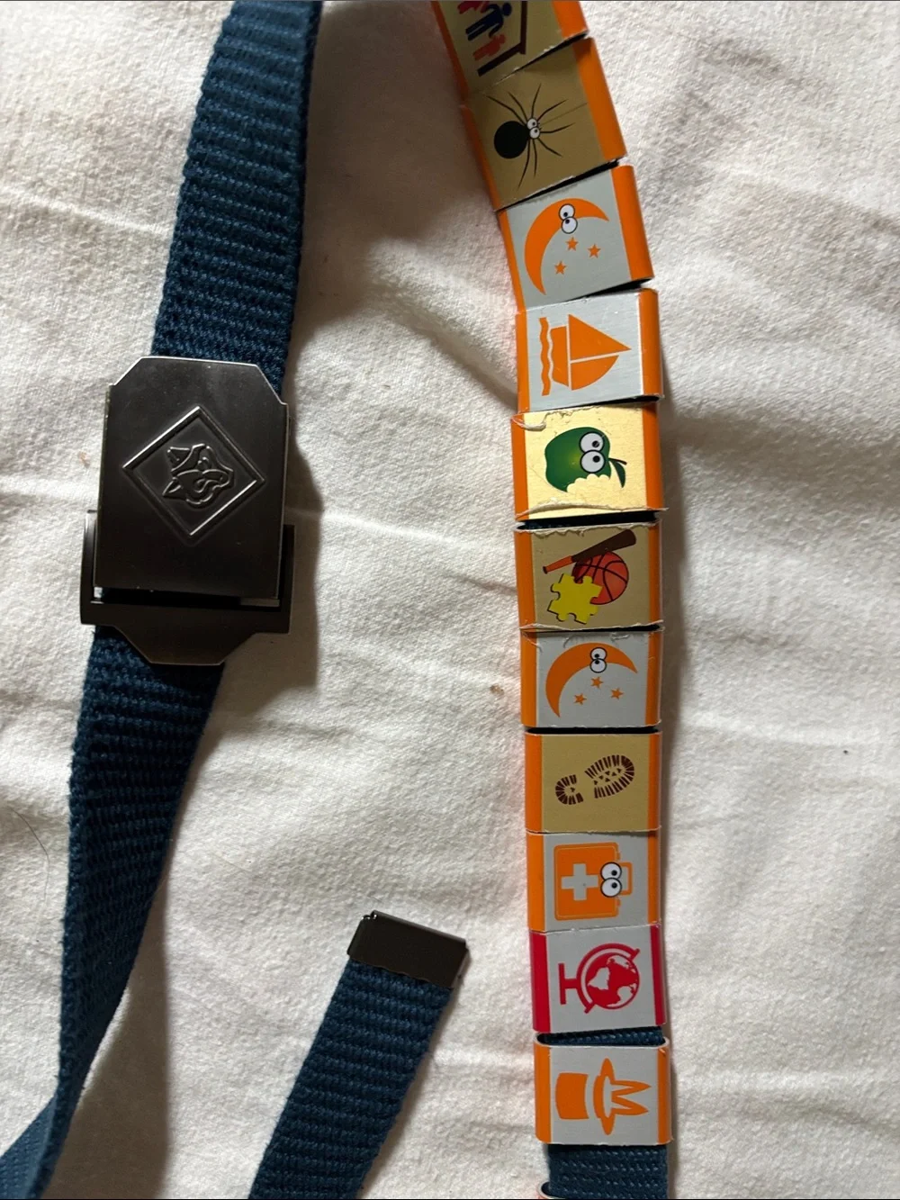 Navy Boy Scouts Blue Webbing Belt with Tile Badges.